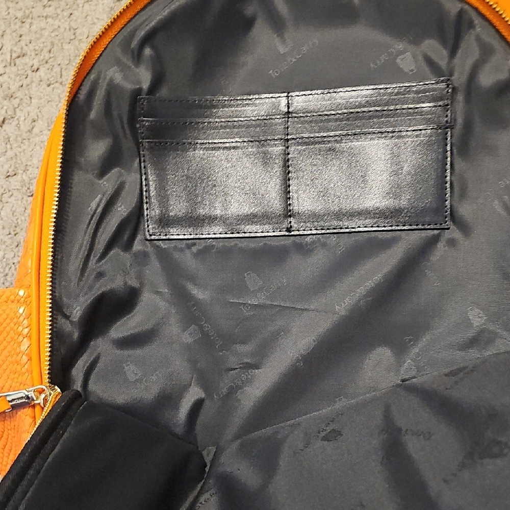 Tote & Carry Textured Orange Backpack - Picture 2 of 6